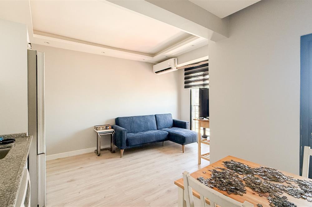 Karesi Aygören'de Satılık Eşyalı 1+1 Yerden Isıtmalı Daire