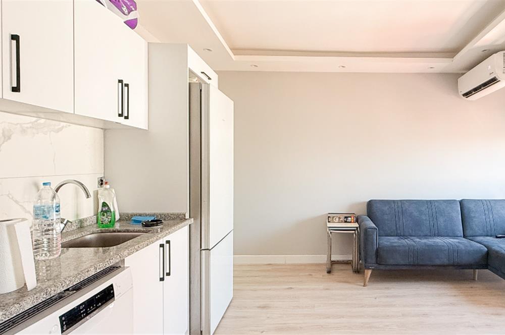 Karesi Aygören'de Satılık Eşyalı 1+1 Yerden Isıtmalı Daire