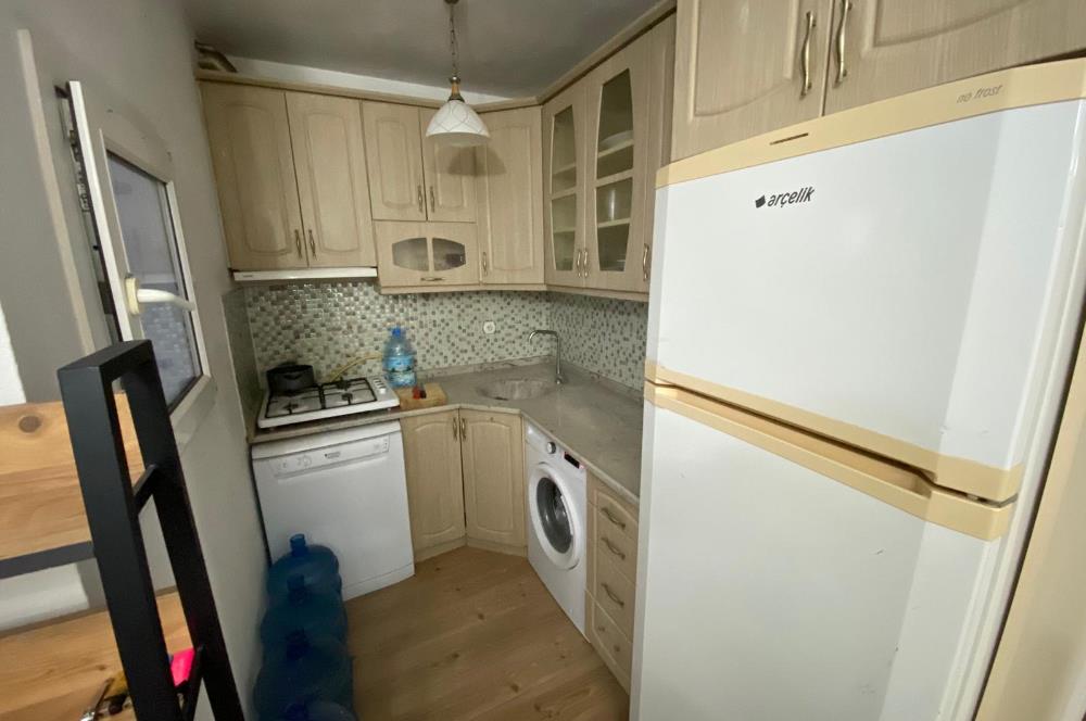 Bodrum Kumbahçe'de 2+1 Kale ve Deniz Manzaralı Ortak Teras Kullanımlı Satılık Daire