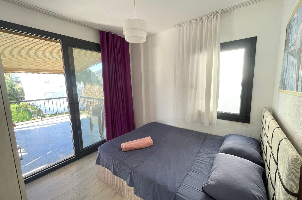 BODRUM AKYARLARDA PLAJLI SİTE İÇERİSİNDE  KİRALIK DAİRE