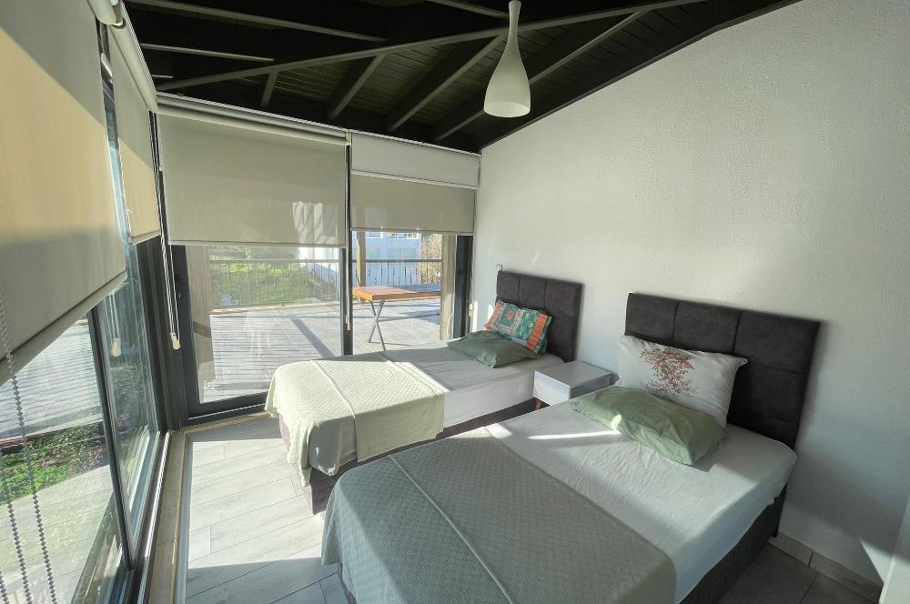 BODRUM AKYARLARDA PLAJLI SİTE İÇERİSİNDE  KİRALIK DAİRE