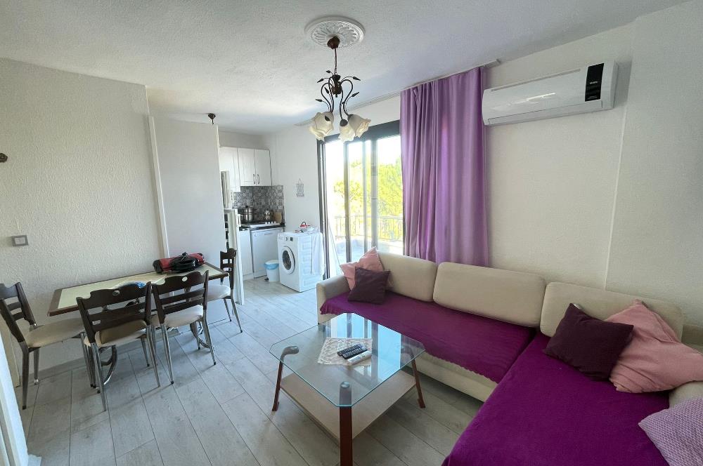 BODRUM AKYARLARDA PLAJLI SİTE İÇERİSİNDE  KİRALIK DAİRE