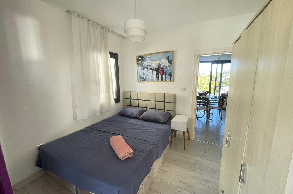 BODRUM AKYARLARDA PLAJLI SİTE İÇERİSİNDE  KİRALIK DAİRE