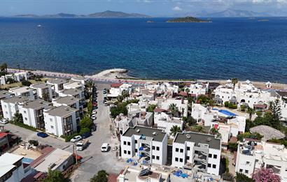 Bodrum Turgutreis Yalı Mevkii Satılık Denize Sıfır Havuzlu Site İçinde Yeni Daire ve Dubleksler