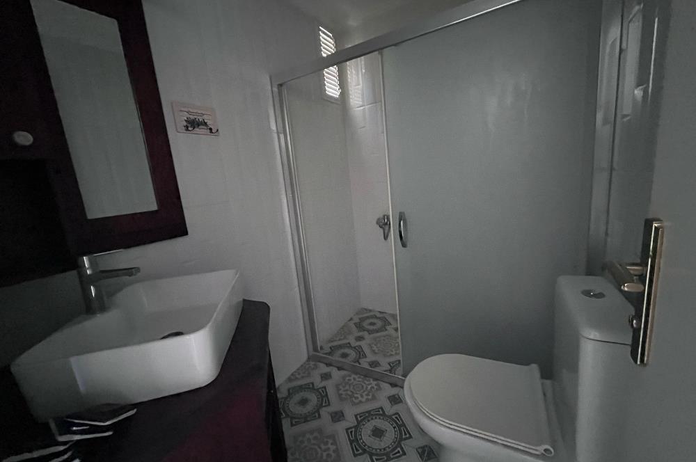 Turgutreis Yalı'da Denize Sıfır Sitede Satılık Tripleks Daire