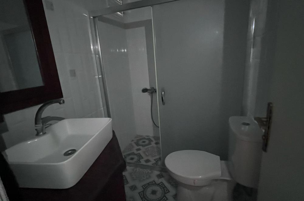 Turgutreis Yalı'da Denize Sıfır Sitede Satılık Tripleks Daire