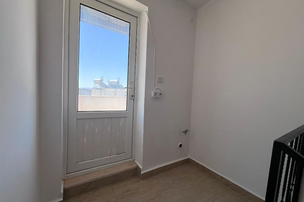 Turgutreis Yalı'da Denize Sıfır Sitede Satılık Tripleks Daire