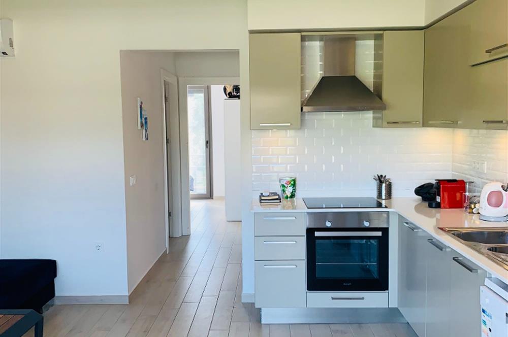 Bodrum Türkbükü Sezonluk Kiralık Daire | Plajlara Düz Ayak Yürüme Mesafesinde Lüks Site Yaşamı