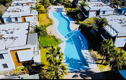 Bodrum Türkbükü Sezonluk Kiralık Daire | Plajlara Düz Ayak Yürüme Mesafesinde Lüks Site Yaşamı