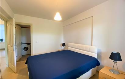 Kiralık Denize Sıfır Özel Kum Plajlı ve Havuzlu Site içerisinde Bahçe Katı Residance Daire