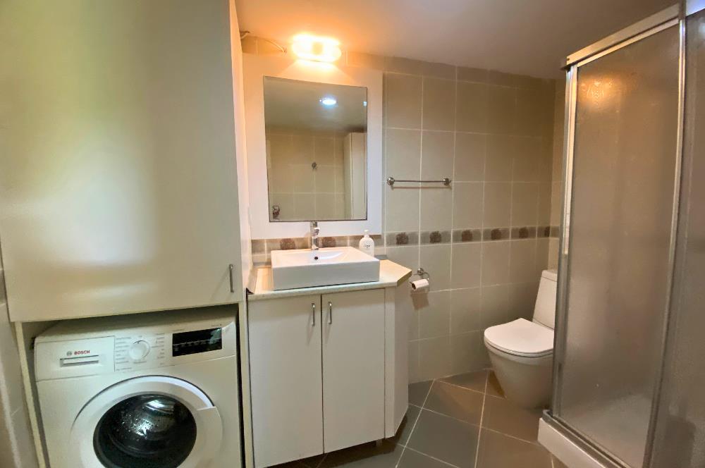 Kiralık Denize Sıfır Özel Kum Plajlı ve Havuzlu Site içerisinde Bahçe Katı Residance Daire
