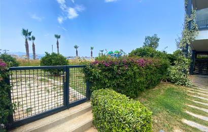 Kiralık Denize Sıfır Özel Kum Plajlı ve Havuzlu Site içerisinde Bahçe Katı Residance Daire