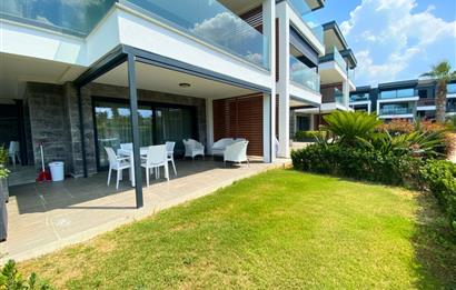 Kiralık Denize Sıfır Özel Kum Plajlı ve Havuzlu Site içerisinde Bahçe Katı Residance Daire