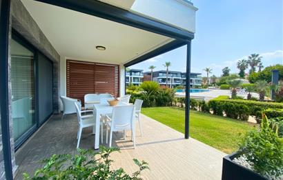 Kiralık Denize Sıfır Özel Kum Plajlı ve Havuzlu Site içerisinde Bahçe Katı Residance Daire