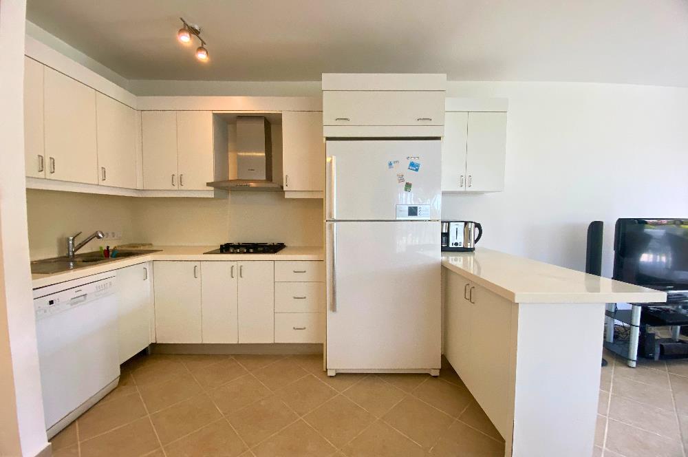 Kiralık Denize Sıfır Özel Kum Plajlı ve Havuzlu Site içerisinde Bahçe Katı Residance Daire