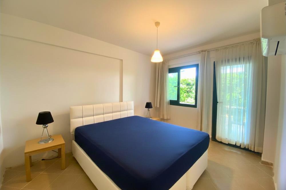 Kiralık Denize Sıfır Özel Kum Plajlı ve Havuzlu Site içerisinde Bahçe Katı Residance Daire