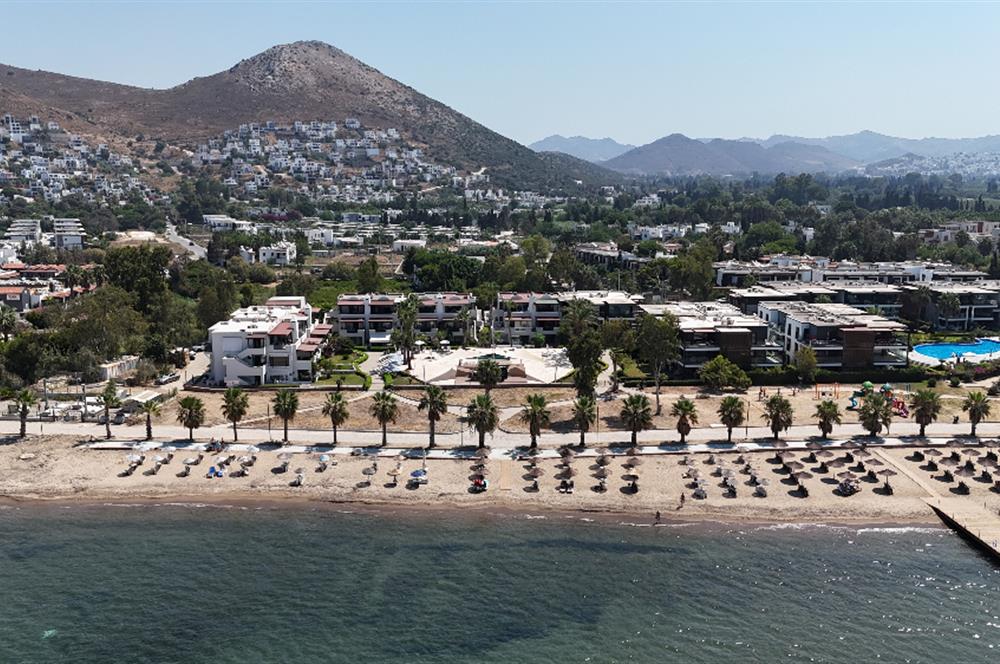 Kiralık Denize Sıfır Özel Kum Plajlı ve Havuzlu Site içerisinde Bahçe Katı Residance Daire