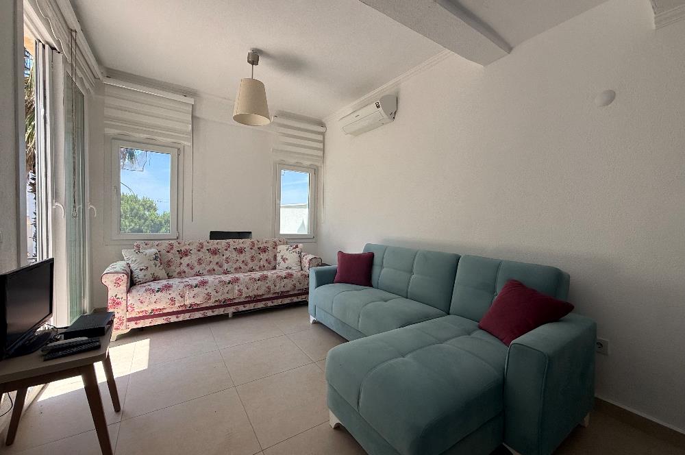 Bodrum Gümüşlükte Satılık Denize Yürüme Mesafesinde Deniz Manzaralı ve Müstakil Bahçeli 3+1 