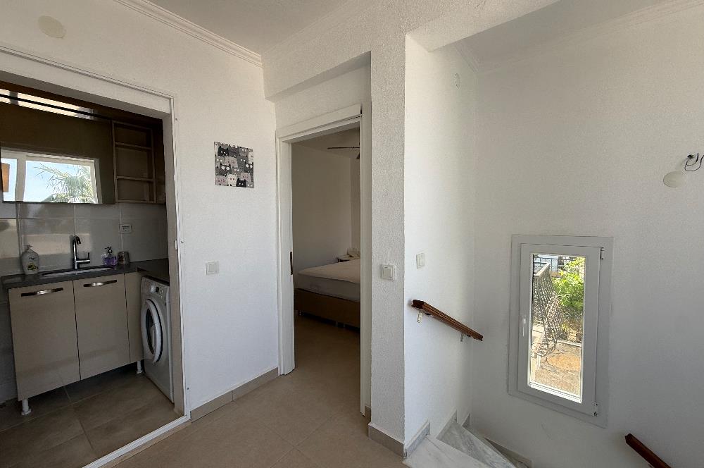 Bodrum Gümüşlükte Satılık Denize Yürüme Mesafesinde Deniz Manzaralı ve Müstakil Bahçeli 3+1 