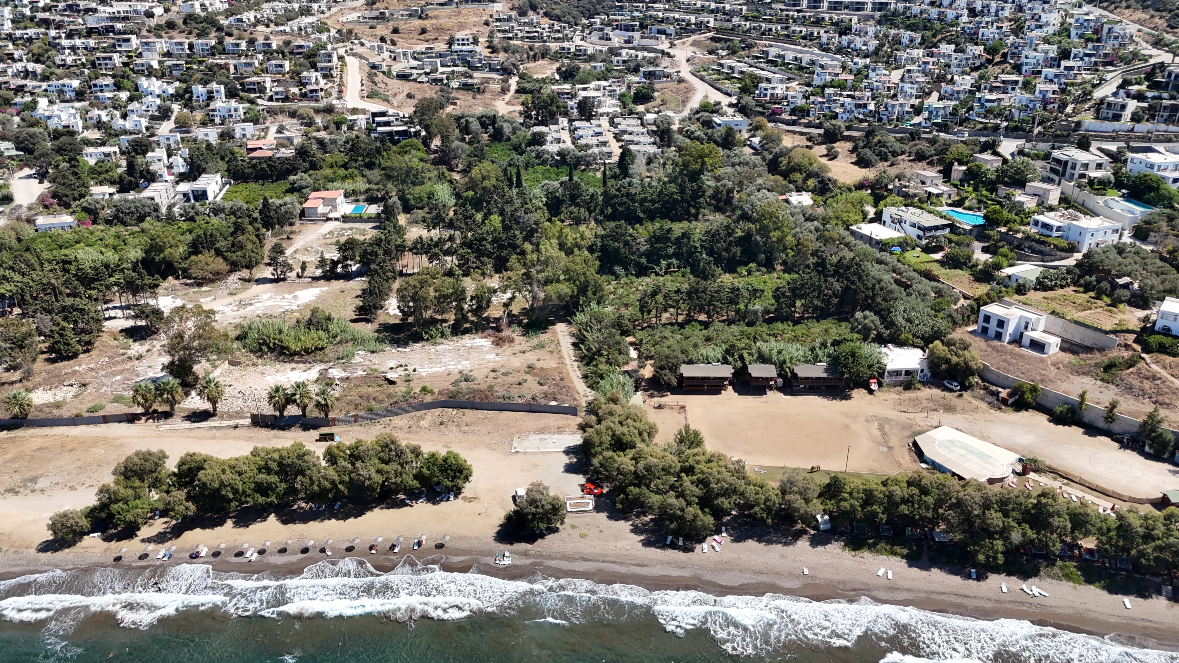 Bodrum Gümüşlükte Satılık Denize Yürüme Mesafesinde Deniz Manzaralı ve Müstakil Bahçeli 3+1 