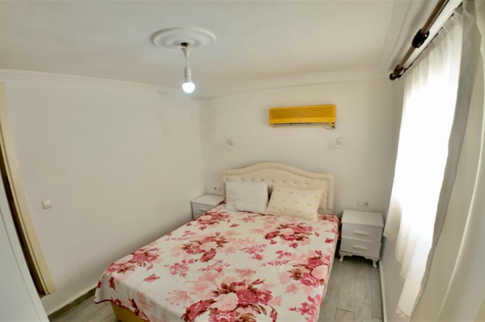 DATÇA CUMHURİYET MEYDANINDA YILLIK KİRALIK 2+1 EŞYALI DAİRE