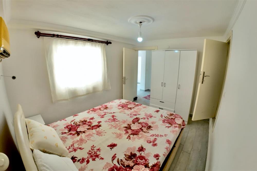DATÇA CUMHURİYET MEYDANINDA YILLIK KİRALIK 2+1 EŞYALI DAİRE