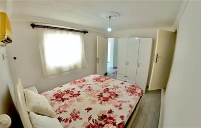 DATÇA CUMHURİYET MEYDANINDA YILLIK KİRALIK 2+1 EŞYALI DAİRE