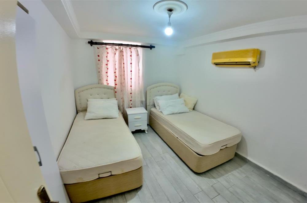 DATÇA CUMHURİYET MEYDANINDA YILLIK KİRALIK 2+1 EŞYALI DAİRE