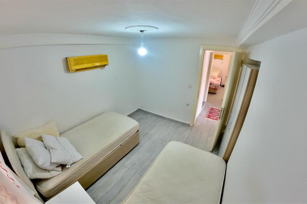DATÇA CUMHURİYET MEYDANINDA YILLIK KİRALIK 2+1 EŞYALI DAİRE