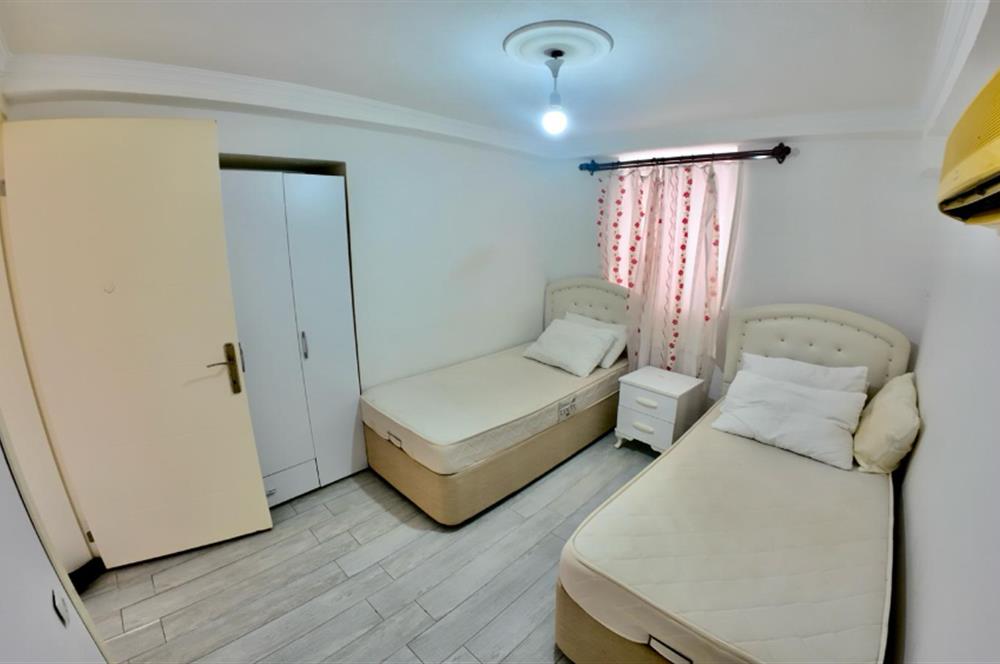 DATÇA CUMHURİYET MEYDANINDA YILLIK KİRALIK 2+1 EŞYALI DAİRE