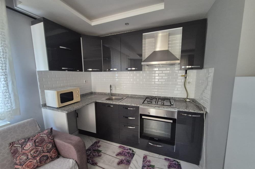 C21 BAL'DAN İZMİR YOLU DOĞTAŞ ARKASINDA EŞYALI 1+1 SATILIK DAİRE