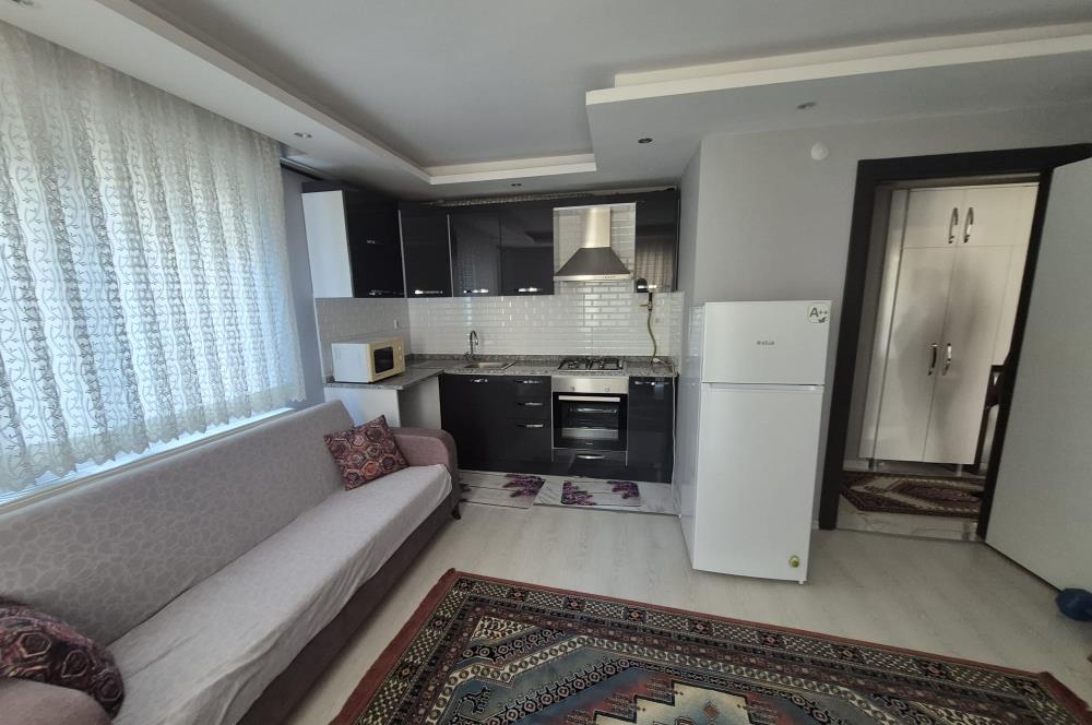 C21 BAL'DAN İZMİR YOLU DOĞTAŞ ARKASINDA EŞYALI 1+1 SATILIK DAİRE