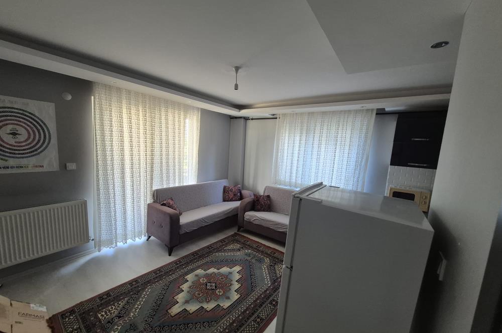 C21 BAL'DAN İZMİR YOLU DOĞTAŞ ARKASINDA EŞYALI 1+1 SATILIK DAİRE