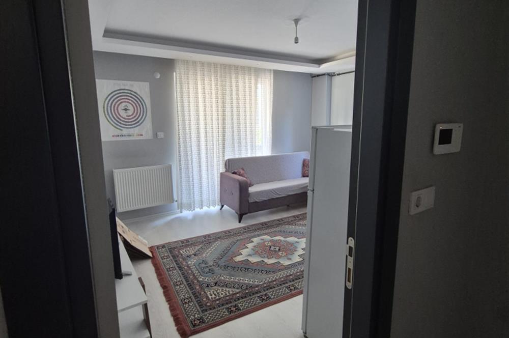 C21 BAL'DAN İZMİR YOLU DOĞTAŞ ARKASINDA EŞYALI 1+1 SATILIK DAİRE