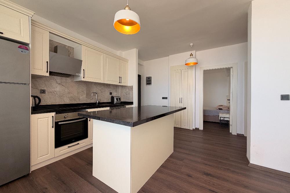 Gümüşlük Denize Sıfır Site İçerisinde Satılık 2+1 Daire