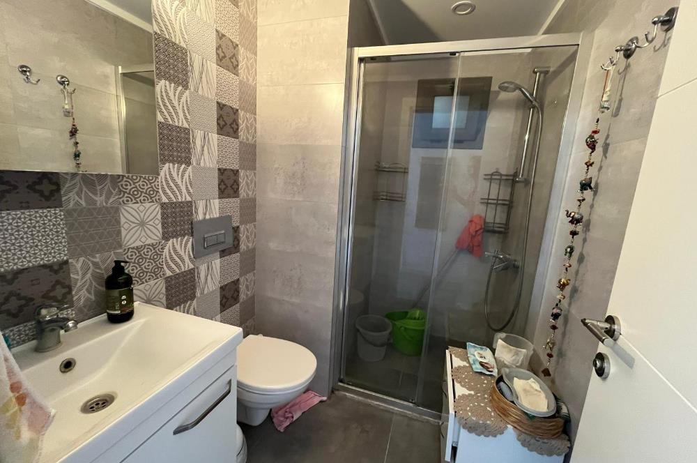 Turgutreis'de Havuzlu Sitede Satılık 3+1 Bahçeli Daire