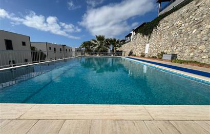 Turgutreis'de Havuzlu Sitede Satılık 3+1 Bahçeli Daire