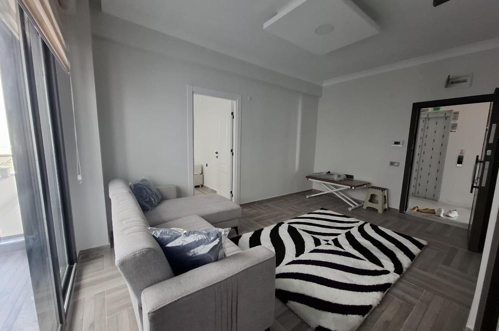 C21 BAL'DAN TEKNİK LİSE CADDESİNDE FULL EŞYALI 1+1 KİRALIK DAİRE