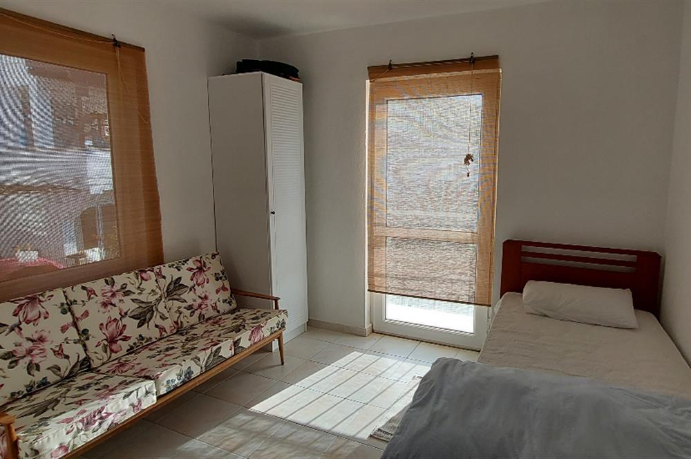 Bodrum-Adabükü'nde özel plajlı yaz dönemi kiralık dubleks daire
