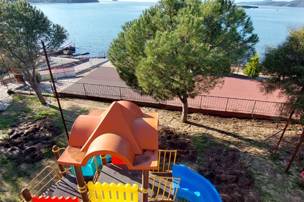 Bodrum-Adabükü'nde özel plajlı yaz dönemi kiralık dubleks daire