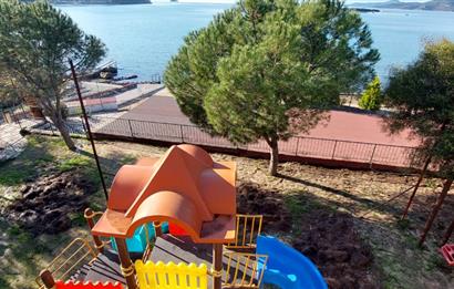 Bodrum-Adabükü'nde özel plajlı yaz dönemi kiralık dubleks daire