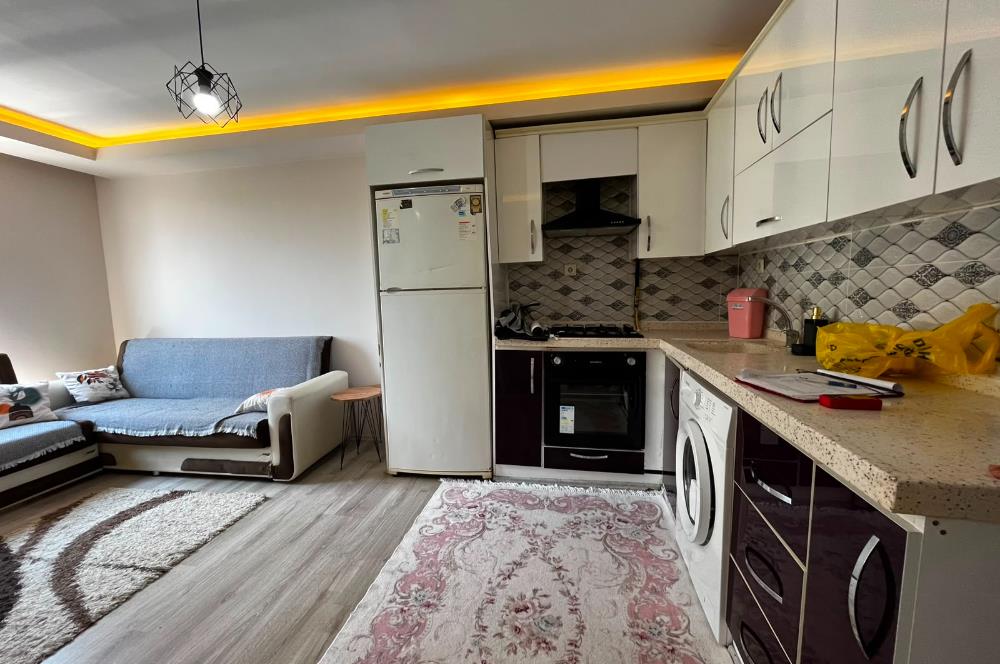 C21 BAL'dan Sütlüce Mah. NEF'e ve Soma Caddesi Yakını 1+1 Daire