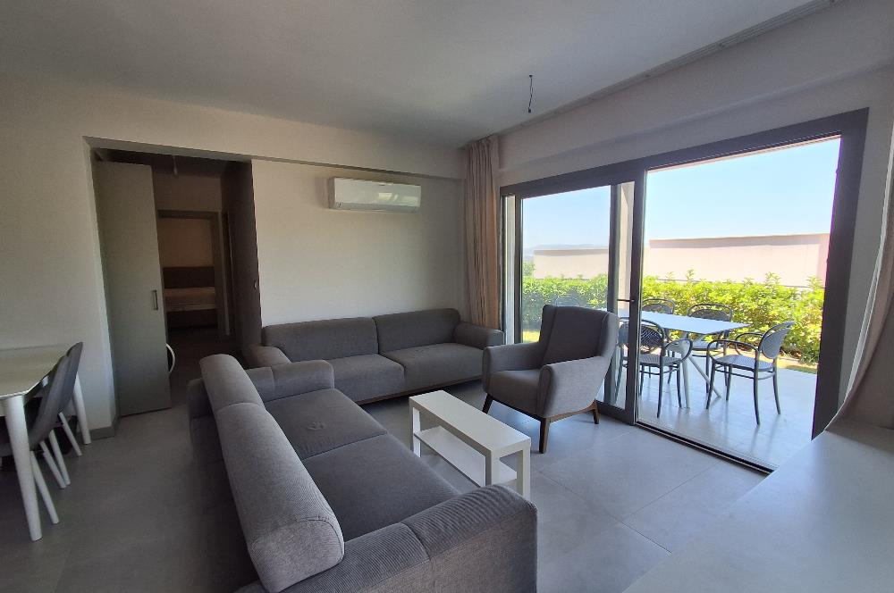 Dörttepe'de havuzlu sitede  aydan aya ödemeli 2+1 bahce katı daire