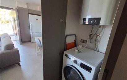 Dörttepe'de havuzlu sitede  aydan aya ödemeli 2+1 bahce katı daire