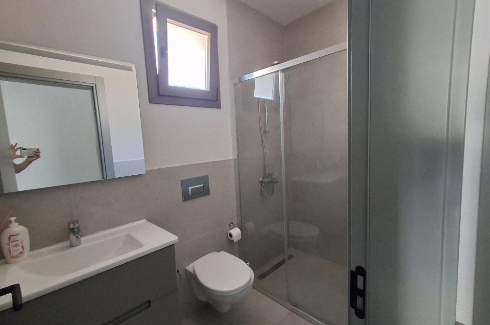 Dörttepe'de havuzlu sitede  aydan aya ödemeli 2+1 bahce katı daire