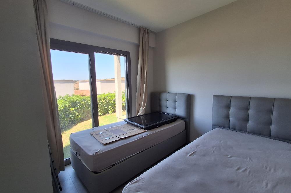 Dörttepe'de havuzlu sitede  aydan aya ödemeli 2+1 bahce katı daire