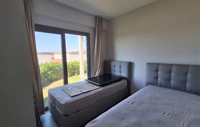 Dörttepe'de havuzlu sitede  aydan aya ödemeli 2+1 bahce katı daire