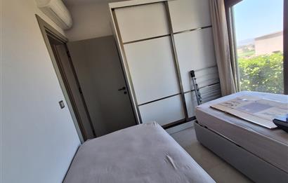 Dörttepe'de havuzlu sitede  aydan aya ödemeli 2+1 bahce katı daire