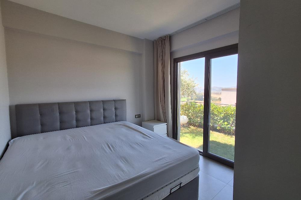 Dörttepe'de havuzlu sitede  aydan aya ödemeli 2+1 bahce katı daire
