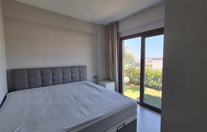 Dörttepe'de havuzlu sitede  aydan aya ödemeli 2+1 bahce katı daire